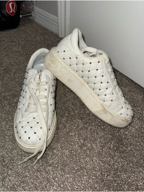 Jennifer Lopez White Quilted Sneakers with Silver Studs